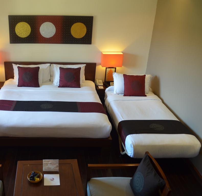 Hotel Nikko Bali Benoa Beach Nusa Dua  Exterior foto A hotel room with a king bed and a single bed